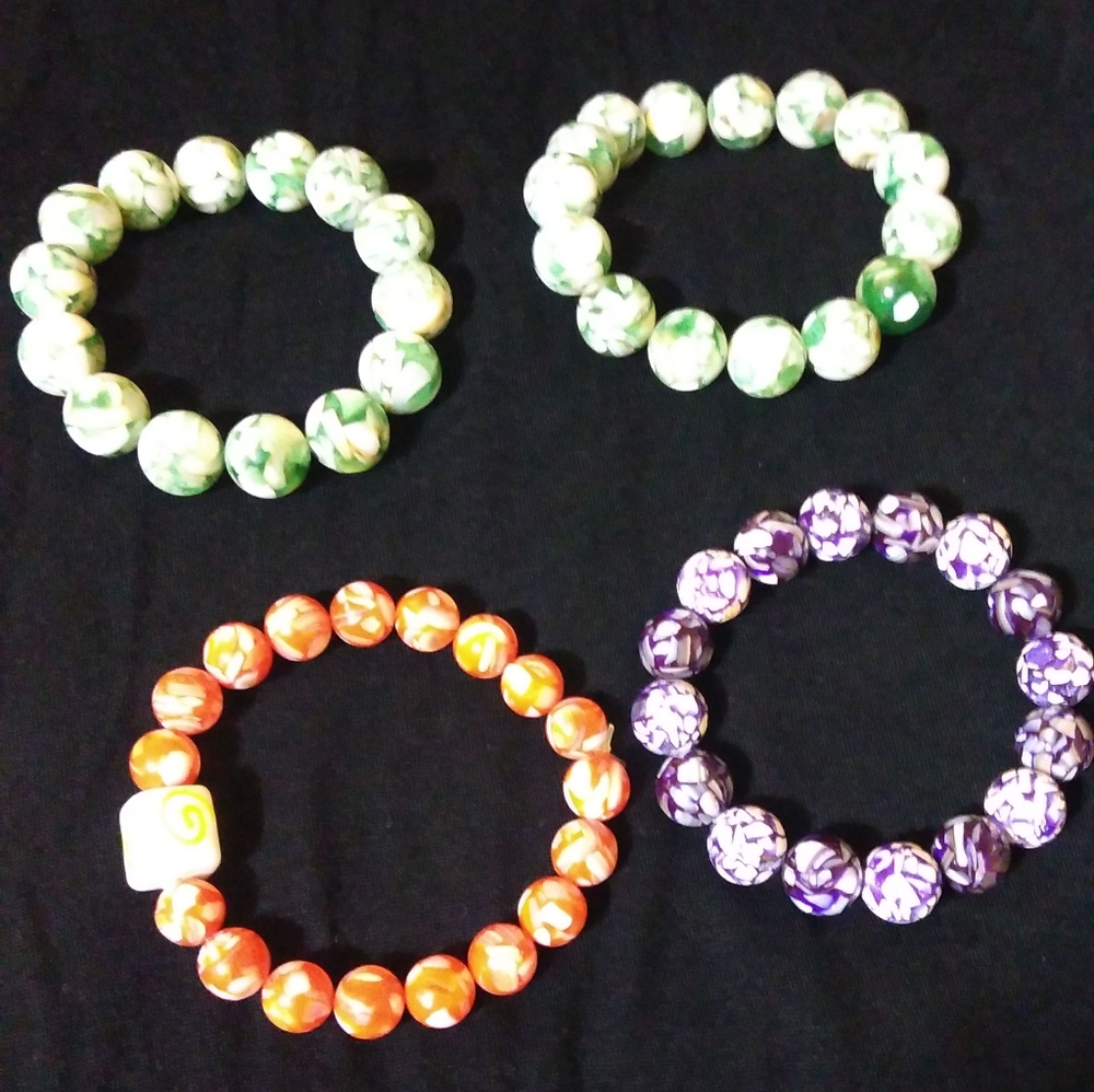 4 for $25 Mother of Pearl handmade bracelets.